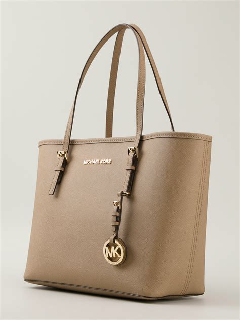 michael kors jet set tote logo brown|Michael Kors jet set saffiano.